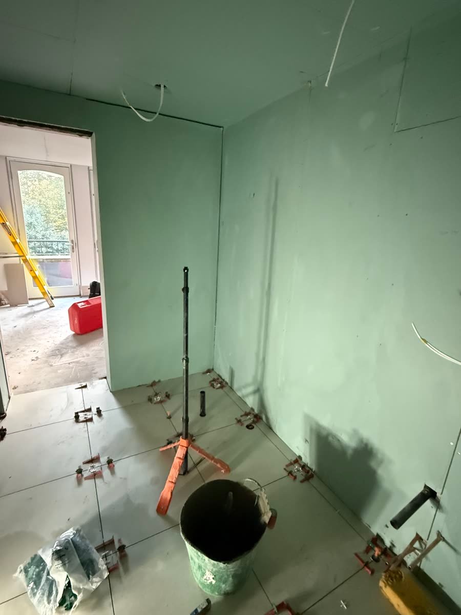 Wet room before tiling, tanked walls and floor prep